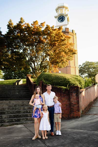 Dr. Brian McNiece and his family outside the Rome Georgia Clocktower